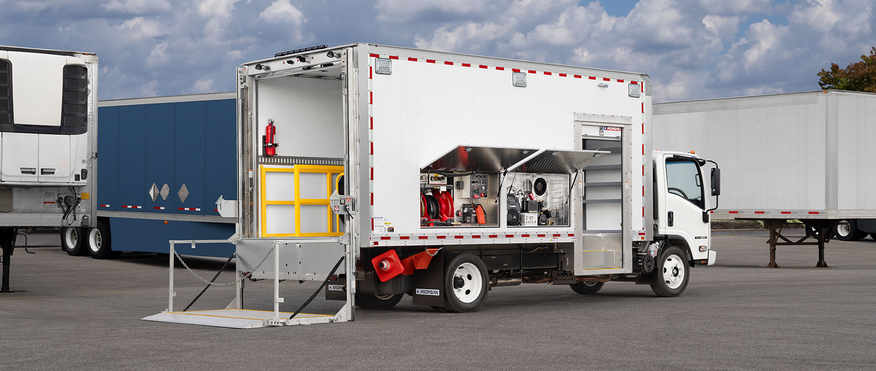 Specialty Morgan Service Unit featuring a worker on location